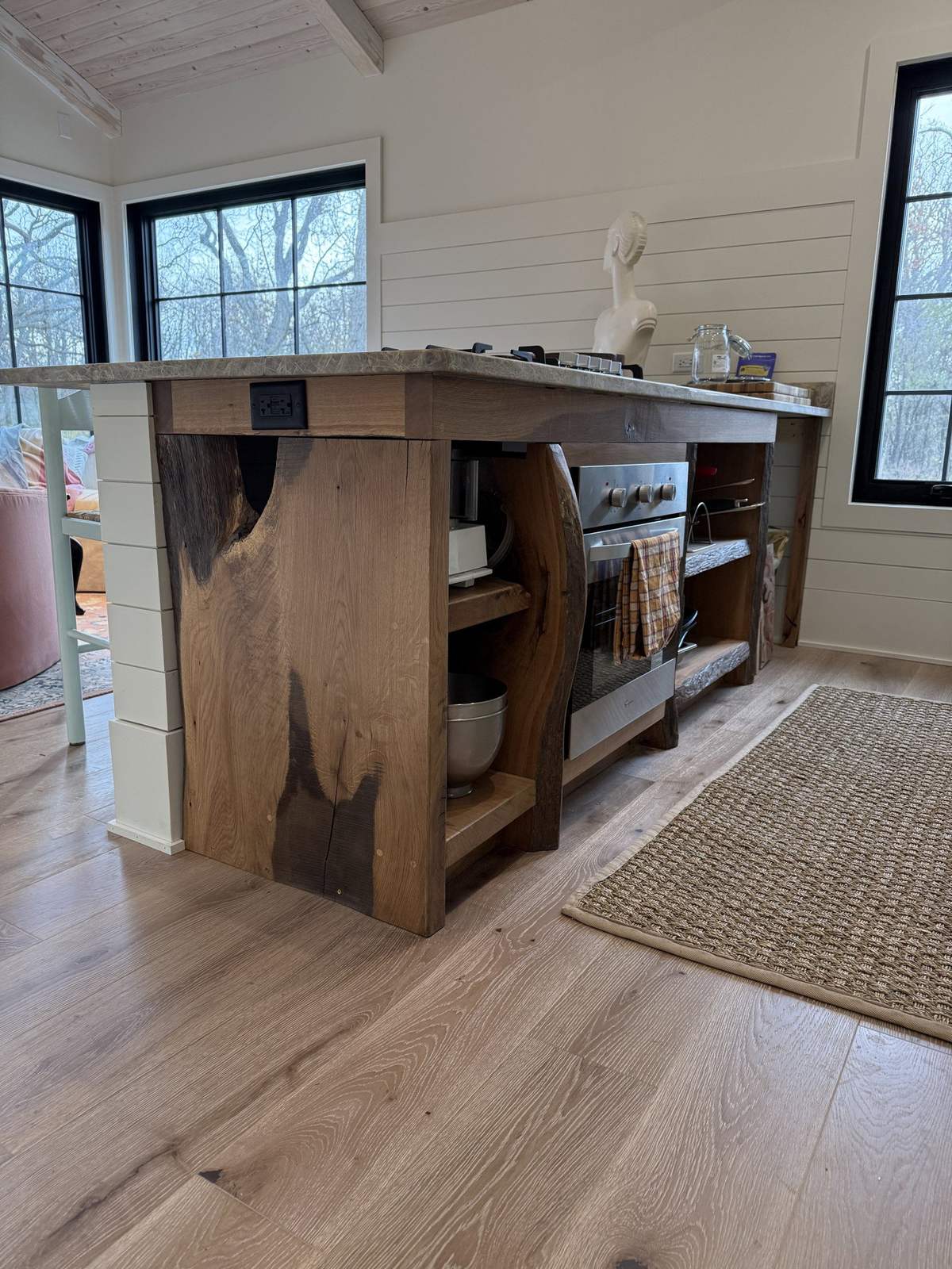 Wood kitchen island with open shelving